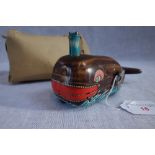 A VINTAGE JAPANESE TINPLATE CLOCKWORK WHALE "Billy the Ball Blowing Magic Whale" in working order