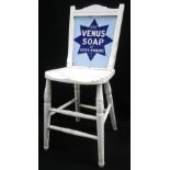 AN EARLY 20TH CENTURY WHITE PAINTED SHOP CHAIR, with inset enamel (double sided) sign, 'Use Venus