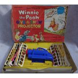 CHAD VALLEY CO LTD; WALT DISNEY'S WINNIE THE POOH 'GIVE-A-SHOW' PROJECTOR' with slides, circa 1960s,