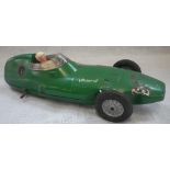 A VANWALL RACING CAR, with cast metal body in green, circa 1950s, 22.5cm long (wheel missing)