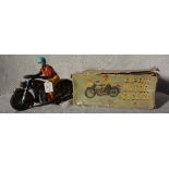 MODERN TOYS; A 1950S TINPLATE 'EXPERT MOTOR CYCLIST' battery operated, 'He rides on, drives, stops