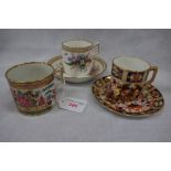 A VICTORIAN ROYAL WORCESTER CABINET CUP AND SAUCER, another similar and a cabinet cup