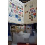 A STAMP ALBUM containing stamps, loose stamps and a few first day covers