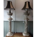 A PAIR OF CONTINENTAL NEOCLASSICAL STYLE CERAMIC STANDARD LAMPS, with shades
