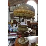 A FRENCH BRASS OIL LAMP (converted to electricity) with original shade with coloured cabochon