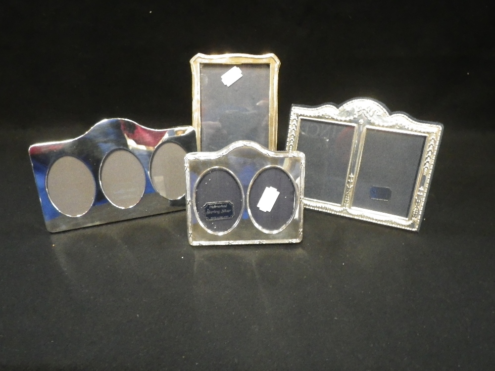 A COLLECTION OF SILVER AND PLATED PHOTOGRAPH FRAMES