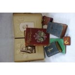 A VICTORIAN PHOTOGRAPH ALBUM containing portraits, an 1895 pocket diary and a small quantity of