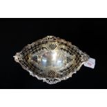 A PIERCED AND EMBOSSED SILVER OVAL SHAPED BON BON DISH, approx 7.80oz