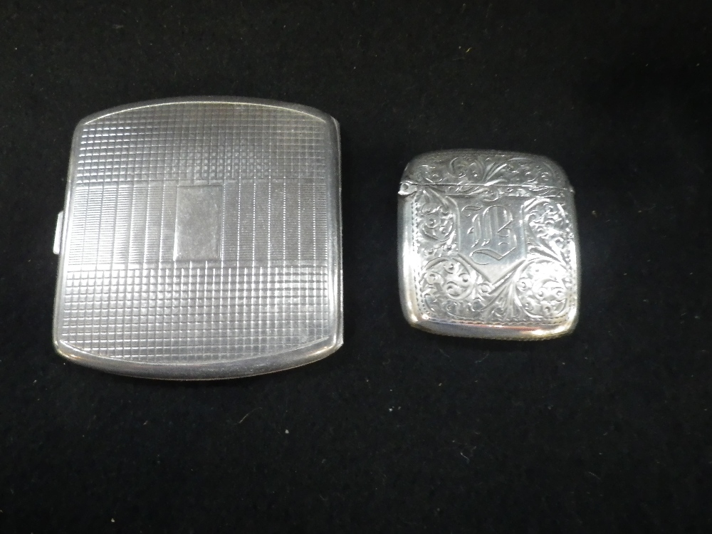 A SILVER VESTA CASE and a compact (2)