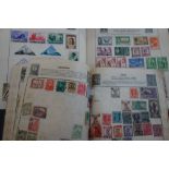 TWO STAMP ALBUMS and a collection of loose stamps