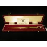 A SILVER GILT LETTER OPENER, circa 1977 in a fitted presentation case