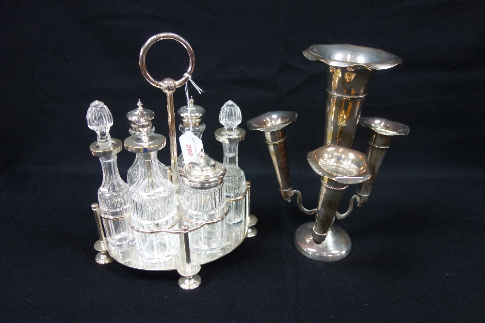A SILVER PLATED CRUET with cut glass bottles and a plate epergne (2)
