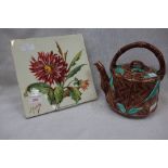 A LATE VICTORIAN GLAZED TILE, decorated with a dahlia, signed 'S. Righetto', 23cm square and a