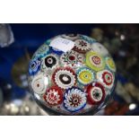 A LARGE 19TH CENTURY MILLEFIORI GLASS PAPERWEIGHT 10cm dia.