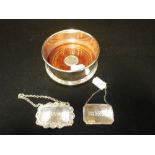 A SILVER AND WOODEN WINE COASTER and two labels (3)