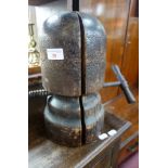 AN ANTIQUE WOOD AND IRON HAT STRETCHING BLOCK