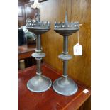 A PAIR OF 19TH CENTURY BRASS GOTHIC REVIVAL PRICKETT CANDLESTICKS with knopped stems and trefoil