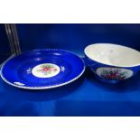 A RUSSIAN BOWL, decorated with flowers within a blue border, 16.5cm dia. and a matching plate 23.5cm