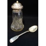 A CUT GLASS AND UNMARKED WHITE METAL SUGAR CASTOR, together with a silver fiddle pattern dessert