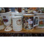 A COLLECTION OF ROYAL COMMEMORATIVE CERAMICS to include tankards and Bell's decanters