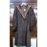 A VINTAGE FUR COAT