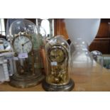 A COLLECTION OF ANNIVERSARY CLOCKS and glass/plastic spare domes