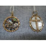 A CROSS PENDANT, stamped 22k and one other openwork floral pendant (2)