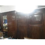 AN EDWARDIAN MAHOGANY WARDROBE by Hamptons of London with fitted interior and another Edwardian