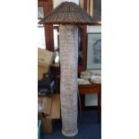 A VINTAGE POTTERY STANDARD LAMP in the form of a palm tree, with 'stick' woven shade, 178cm high (