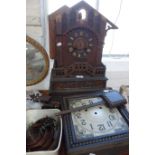 A 19TH CENTURY BLACK FOREST CUCKOO MANTEL CLOCK and an early 20th century wall clock (2) (in need of