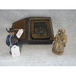 A CHINESE INK STAND (examine) a Chinese ceramic figure and a brass figure of an elder (3)