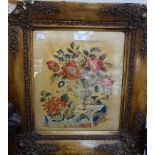 A VICTORIAN NEEDLEWORK depicting a still life of flowers in a vase