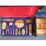 A 'TORTOISESHELL' DRESSING TABLE SET (boxed) and a cigar box