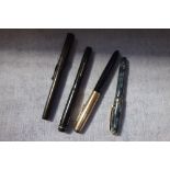 A PARKER 51 GOLD PLATED CAPPED FOUNTAIN PEN, a Waterman's 'Ideal' fountain pen and two similar (4)