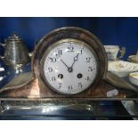 AN EDWARDIAN SILVER PLATED MANTEL CLOCK with white enamel face, 32.5cm wide