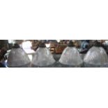 A SET OF FOUR EARLY 20TH CENTURY FLUTED GLASS HANGING LAMP SHADES, 23cm dia.