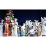 A COLLECTION OF DECORATIVE CERAMIC FIGURES, to include Japanese nuns