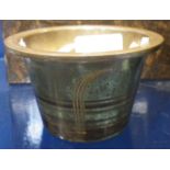 W.M.F. A SMALL PATINATED BRASS POT, the sides with engraved decoration, 9cm dia.