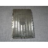 A SILVER CARD CASE, engraved linear decoration with vacant cartouche, 9.5cm high x 6.5cm length (c.