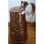 A COPPER JUG, probably Newlyn but unmarked, decorated with repousse fish, the lid with a shell, 21cm