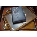 AN EDWARDIAN OAK TEA TRAY, another similar and a Victorian photo album containing some sporting