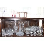 A COLLECTION OF DRINKING GLASSES AND DECANTERS