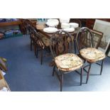 AN OAK REFECTORY TABLE, 153cm long x 76cm wide and a set of six Windsor chairs