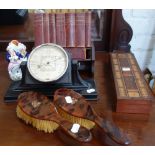 A 1930'S BAKELITE CASED DESK BAROMETER, a crib board, two faux tortoiseshell brushes, a small