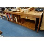 A MID-CENTURY TEAK CABINET, fitted record compartments with sliding top stamped 'made in