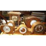 AN EARLY 20TH CENTURY MAHOGANY CASED MANTEL CLOCK by Walker and Hall with a French movement and five