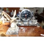 A MODERNIST STYLE DESK CLOCK formed as an engineer's equipment and gears on a veined marble base and