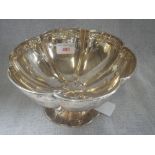 A SILVER FOOTED BOWL, by Roberts & Belk, Sheffield, 1924, circular form with a band of leaves and