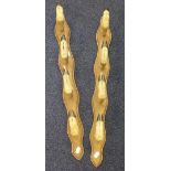 TAXIDERMY: A French rack in the form of two sets of four mounted hooves