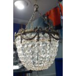 A BAG CHANDELIER with cut glass drops and brass frame with swags, 23cm drop (plus chains)